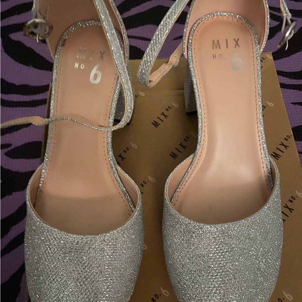 Brand new Silver Chunky heel